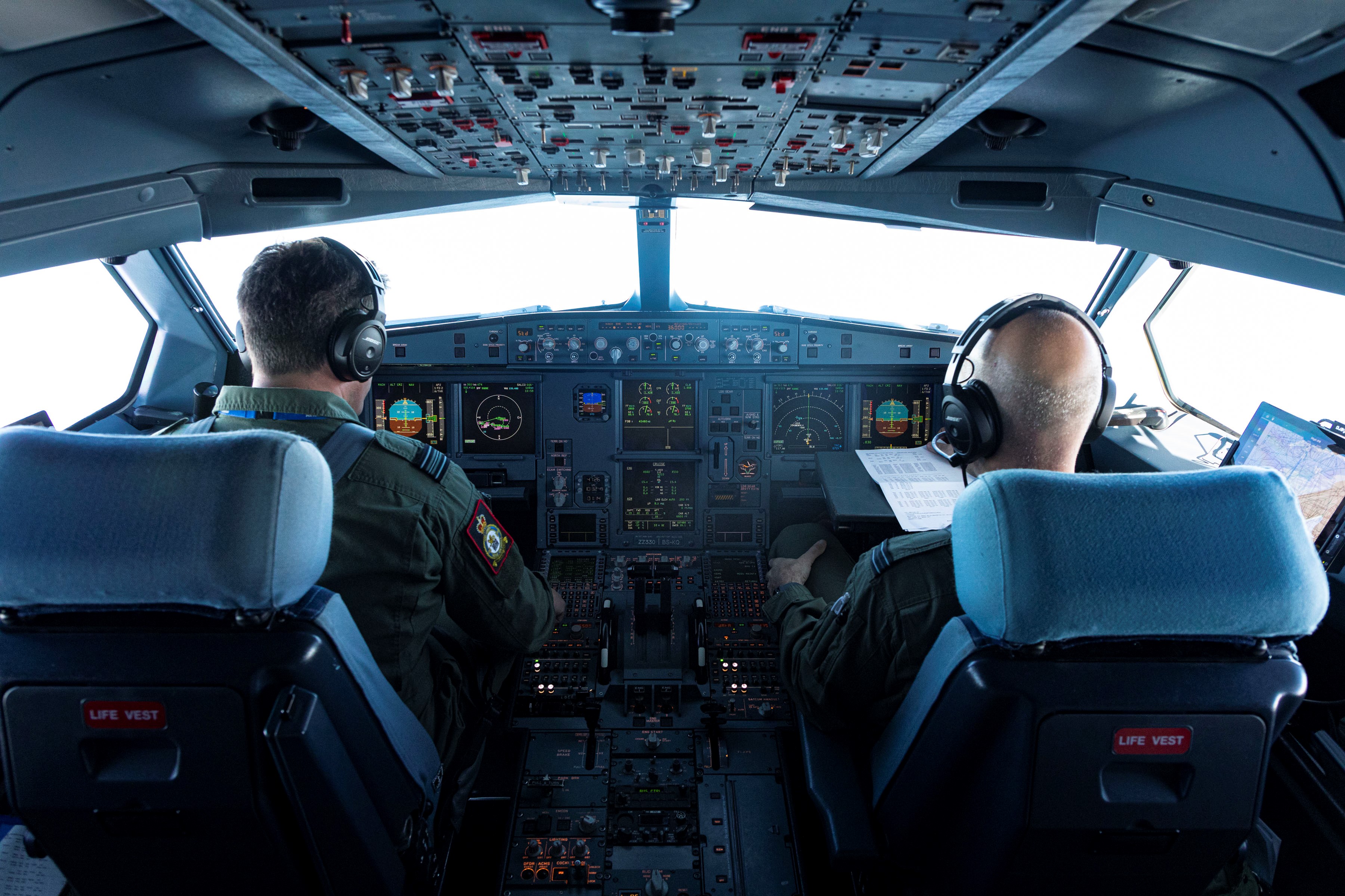 Pilots in the cockpit of the Voyager.